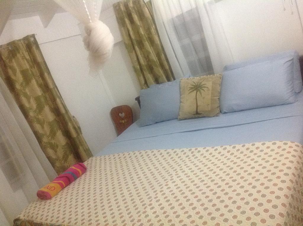 Rainbow Beach Apartments & Rooms Calibishie Habitación foto